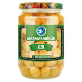 A 670g jar of Marmarabirlik Scratched and Pickled Green Olives, with a green and black label and whole green olives visible through the glass.